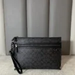 Carry All Pouch In Signature Canvas