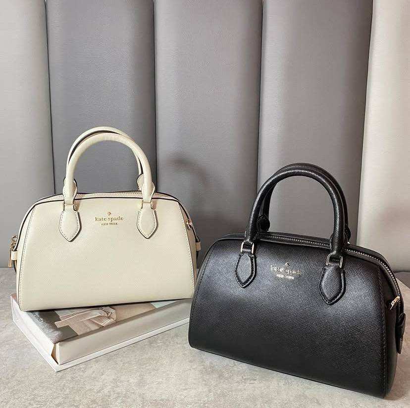 6107208792585391734 Kate Spade Madison Saffiano Leather Duffle Crossbody - Image 1
