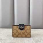 Coach Medium Corner Zip Wallet In Signature Canvas