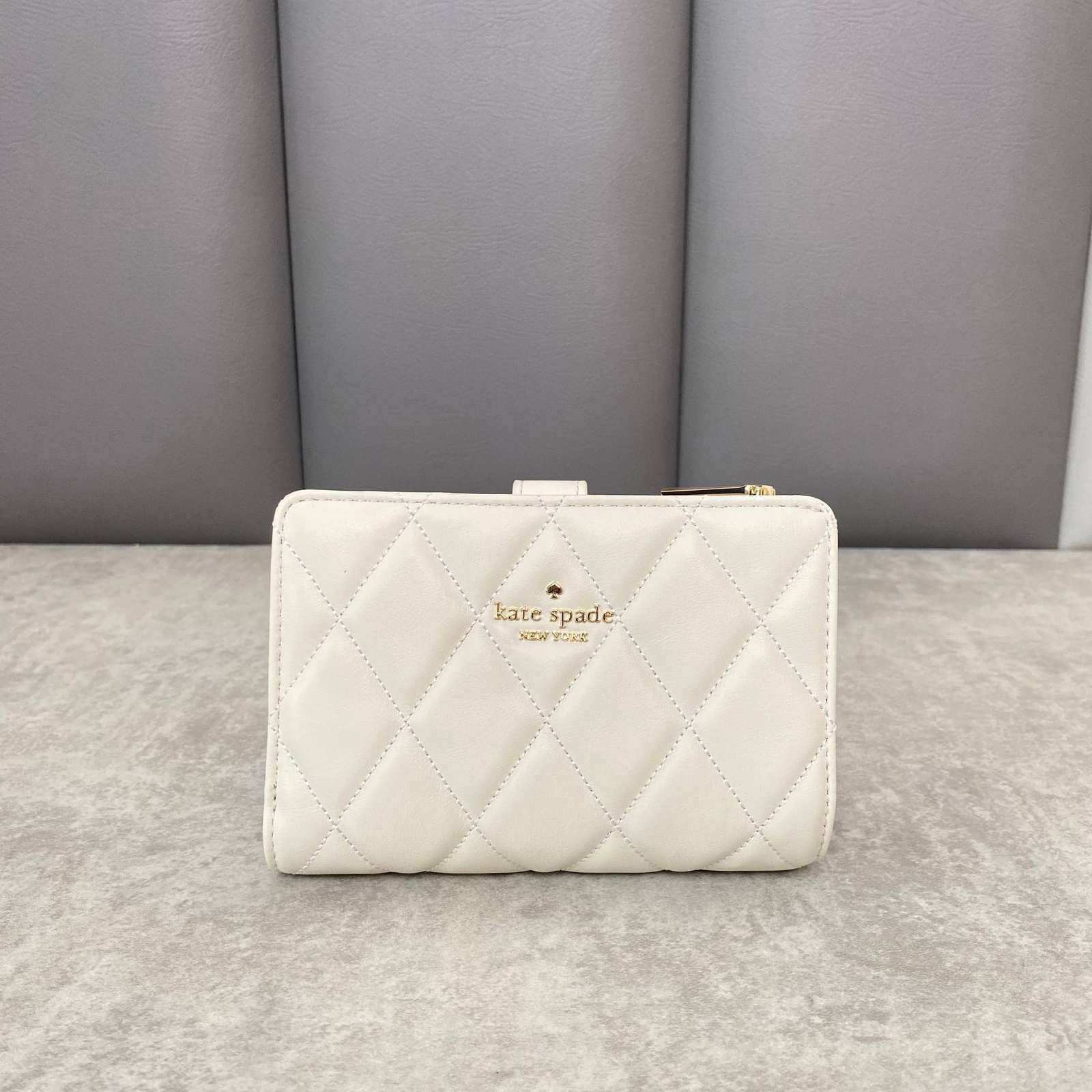 photo_6258074483843337962_w (1) Kate Spade Quilted Medium Bifold Wallet - Image 1